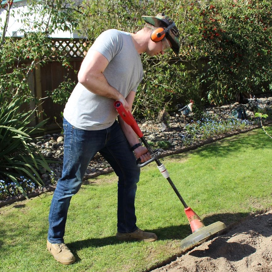 Moving the Lawn While Garden! | Surrey Physiotherapy & Sports Injury Clinic